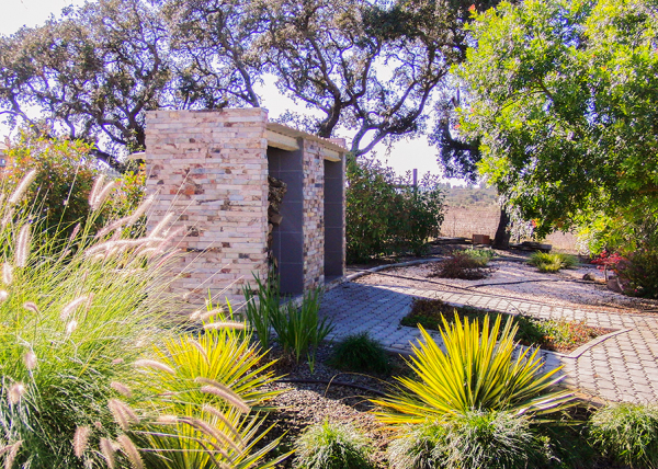 Bore hole cover/wood store